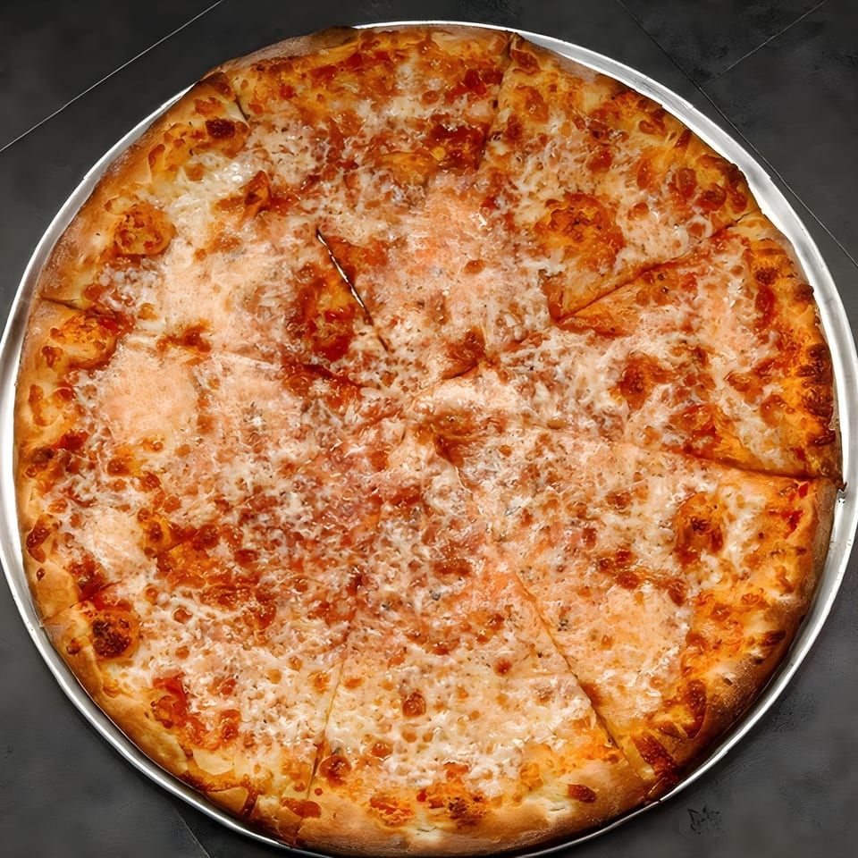 A large, round cheese pizza from Familia Pizzeria, sliced and ready to eat on a metal pan.